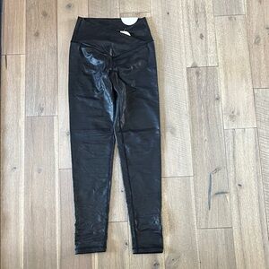 Leather look leggings size sm